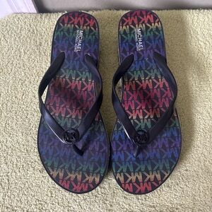 Michael Kors Women’s Black and Multicolor Pattern Flip Flops